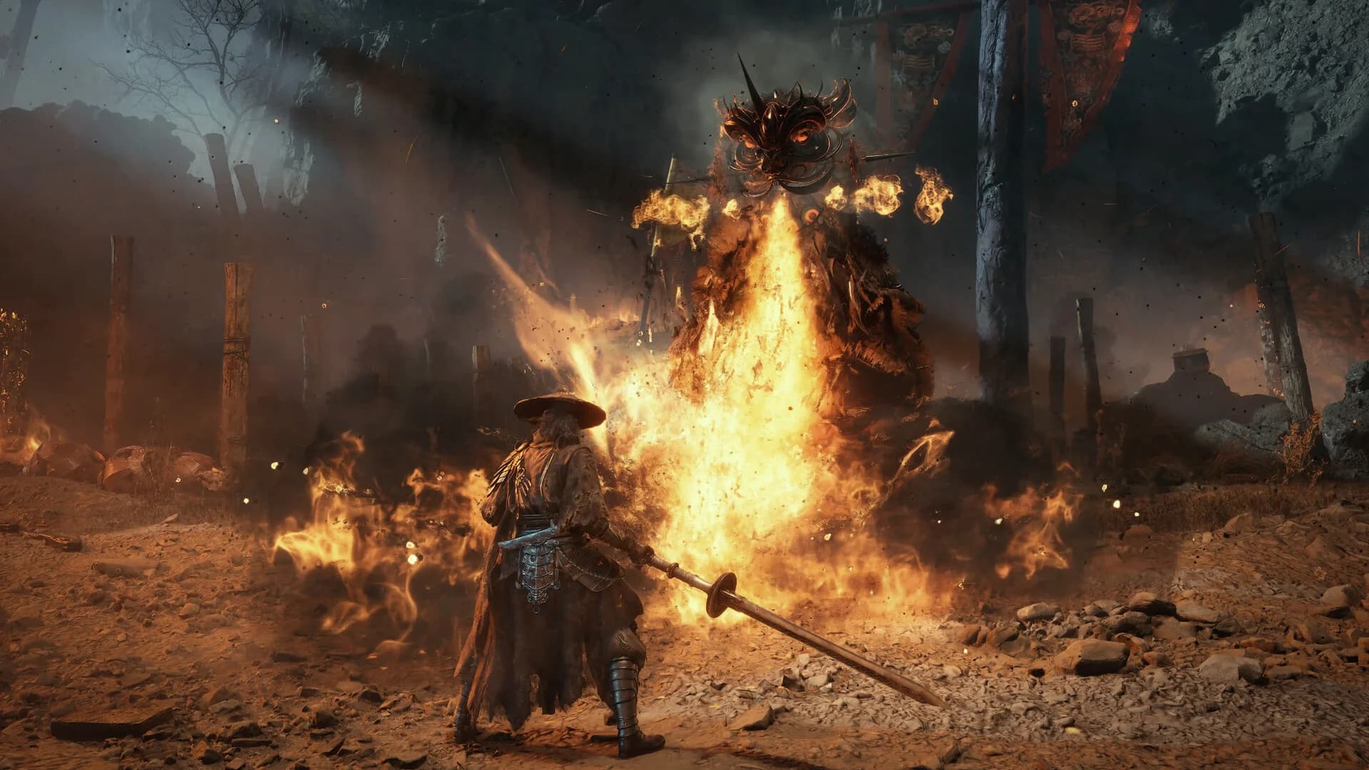 A warrior facing a towering enemy surrounded by fire