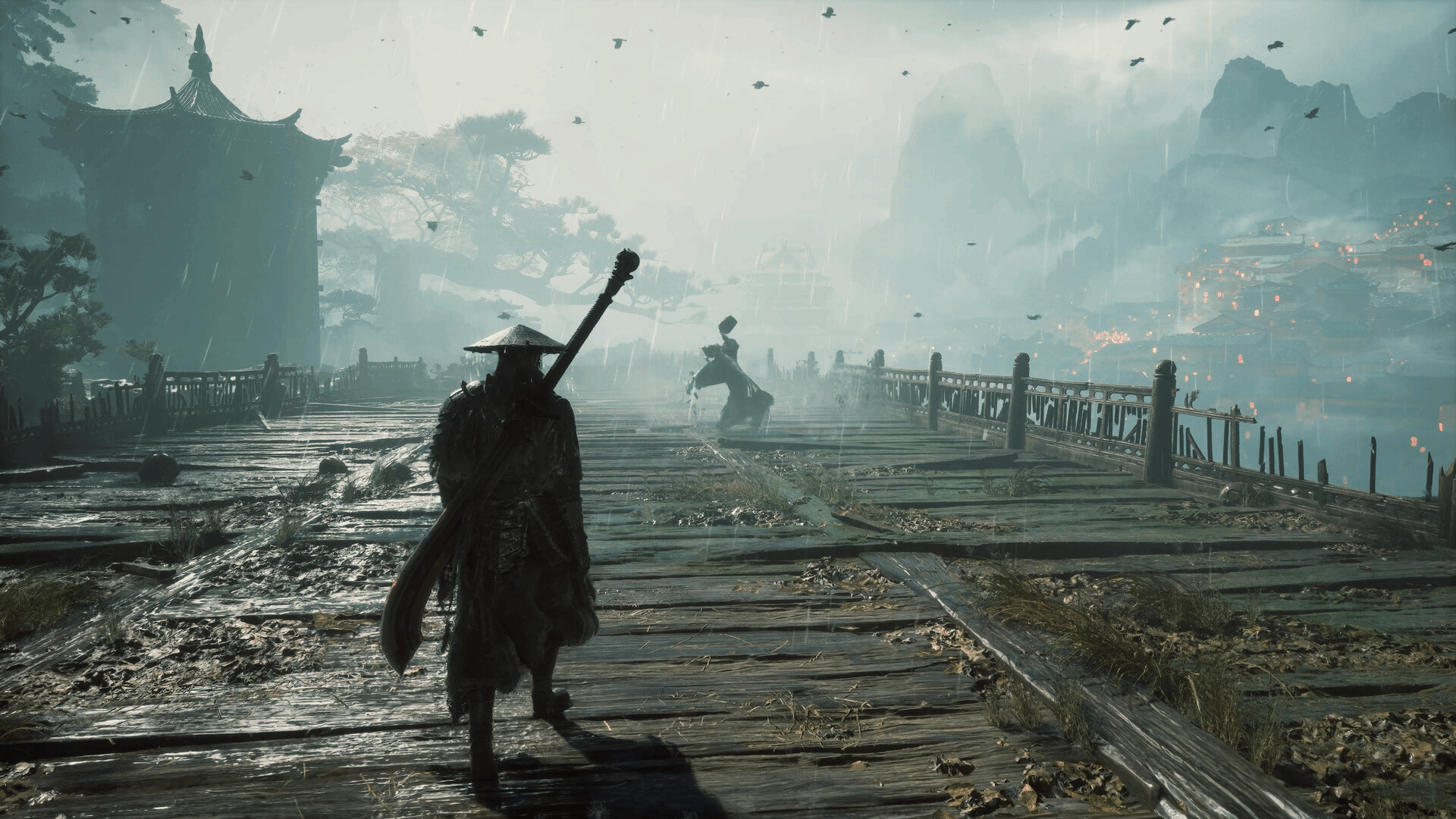 Phantom Blade Zero official screenshot: Soul stands with a long blade on a rain-soaked wooden plank bridge, with misty mountains and a lantern-lit town behind him