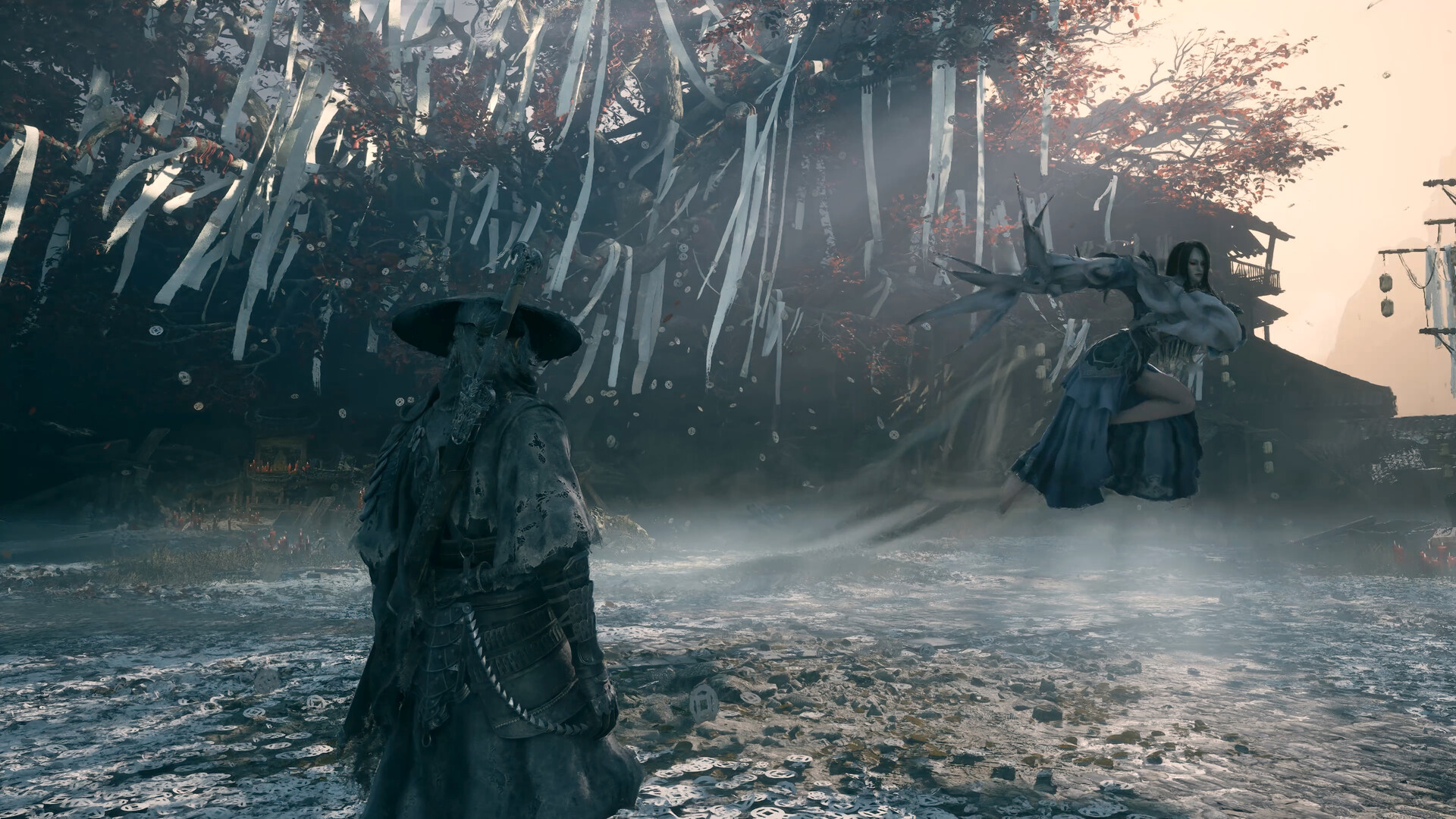 Official screenshot showing a straw-hatted figure seen from behind on a coin-covered ground while a long-haired woman with a tendril-like arm attacks